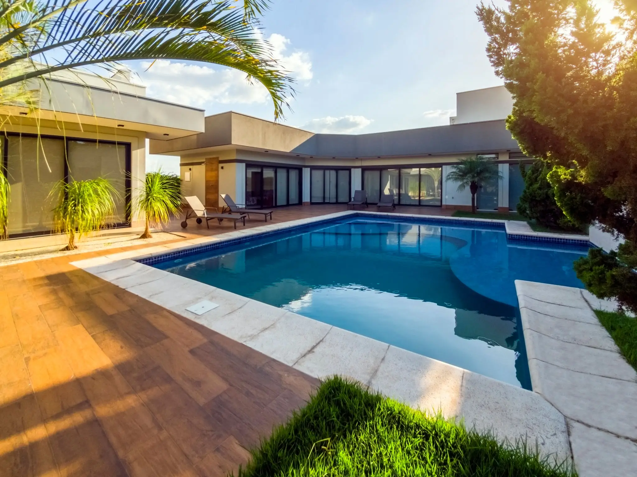 Contemporary home exterior with pool
